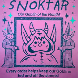 Pink illustrated card from Wizard of Barge featuring a cute goblin named Snoktar between two smiling wizards.